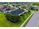 Aerial view of the home showcasing the backyard, landscaping, and neighborhood at 650 Rosemary Cir, Bradenton, FL 34212