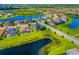 Breathtaking aerial view of the community, highlighting its beautiful lakes and lush landscapes at 650 Rosemary Cir, Bradenton, FL 34212