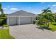 Beautiful single-Gathering home with a three-car garage and well-manicured landscaping at 650 Rosemary Cir, Bradenton, FL 34212