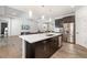 Contemporary kitchen with stainless appliances, ample counter space, and an open design to the living area at 650 Rosemary Cir, Bradenton, FL 34212