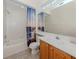 Bright bathroom featuring a bathtub/shower combo and a vanity with a white countertop at 673 Crane Prairie Way, Osprey, FL 34229