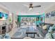 Inviting living room featuring stylish decor, comfortable seating, and a seamless transition to the outdoors at 6731 Washington Pl, Bradenton, FL 34207