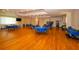 Spacious meeting room with tables and chairs, offering an ideal setting for group activities at 6731 Washington Pl, Bradenton, FL 34207