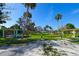 Park with multiple colorful picnic shelters, playground, and grassy areas at 6731 Washington Pl, Bradenton, FL 34207