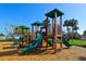 Community playground with slides and activity features at 6731 Washington Pl, Bradenton, FL 34207