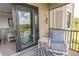 Relaxing balcony with outdoor seating and expansive views at 7005 River Hammock Dr # 303, Bradenton, FL 34212