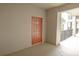 Exterior entryway of a condo, with a neatly painted door, clean floors, and a view of the outdoor walkway at 7005 River Hammock Dr # 303, Bradenton, FL 34212