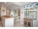 Inviting living area with kitchen views, comfortable seating, and natural light through large windows at 7005 River Hammock Dr # 303, Bradenton, FL 34212