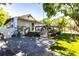 Charming backyard featuring a deck, swing, patio and a lush green lawn at 717 84Th Nw St, Bradenton, FL 34209