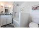 Stylish bathroom showcasing modern tile work, a luxurious shower, and a sleek vanity at 717 84Th Nw St, Bradenton, FL 34209