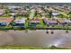 Waterfront home with a screened-in pool in a tranquil neighborhood at 74 Windsor Dr, Englewood, FL 34223