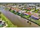 Scenic waterfront homes nestled along a tranquil canal at 74 Windsor Dr, Englewood, FL 34223