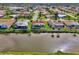 Waterfront home with a screened-in pool in a tranquil neighborhood at 74 Windsor Dr, Englewood, FL 34223