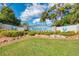 Welcome to Englewood Isles: a beautiful community with lush landscaping at 74 Windsor Dr, Englewood, FL 34223