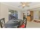Inviting dining area offering a view of the patio and back yard, seamlessly blending indoor and outdoor living at 74 Windsor Dr, Englewood, FL 34223