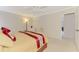 Bedroom featuring carpet flooring, ceiling fan, and access to other rooms at 74 Windsor Dr, Englewood, FL 34223