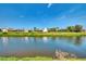 Beautiful canal view from well-maintained lawn makes for an ideal relaxing backdrop at 74 Windsor Dr, Englewood, FL 34223