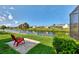 Expansive water views can be enjoyed from this gorgeous backyard with patio at 74 Windsor Dr, Englewood, FL 34223