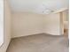 Large main bedroom featuring plush carpeting, ceiling fan, and neutral color palette at 7617 Whitebridge Gln, University Park, FL 34201