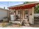A covered back porch with a washer and dryer at 8075 48Th N Ave, St Petersburg, FL 33709