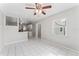 Inviting open-concept living room with tile floors, and bright natural light at 8075 48Th N Ave, St Petersburg, FL 33709