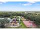 Community amenities including a pool, playground, tennis courts, and a basketball court at 826 Honeyflower Loop, Bradenton, FL 34212