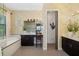 Bathroom featuring a vanity with a granite countertop, a tub, and a separate toilet at 826 Honeyflower Loop, Bradenton, FL 34212