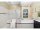 Bathroom featuring a separate tub and shower with a glass enclosure at 826 Honeyflower Loop, Bradenton, FL 34212