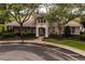 Beautiful community clubhouse with lush landscaping, mature trees, and ample parking at 826 Honeyflower Loop, Bradenton, FL 34212