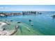 Aerial view of boats and island waterways with clear blue waters, as well as beaches and ocean views at 830 Trento Dr, Venice, FL 34285