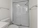 Bright bathroom with glass enclosed shower at 830 Trento Dr, Venice, FL 34285