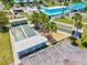 Aerial view showcasing community bocce ball courts, offering a leisurely and social outdoor activity at 830 Trento Dr, Venice, FL 34285
