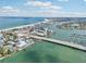 Coastal city, beautiful beach, bridge and boats near a waterfront community at 9300 Gulf Blvd, St Pete Beach, FL 33706