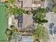 Residential property, waterway access, street access, and mature tree coverage at 9300 Gulf Blvd, St Pete Beach, FL 33706