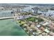 Picturesque waterfront, featuring boats, bridge, park, and various residential homes at 9300 Gulf Blvd, St Pete Beach, FL 33706