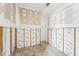 Unfinished basement featuring exposed framework and walls, ready for customization and renovation projects at 9300 Gulf Blvd, St Pete Beach, FL 33706