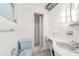 Outdated bathroom featuring a toilet, vanity, and shower, ready for complete renovation and modernization at 9300 Gulf Blvd, St Pete Beach, FL 33706