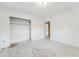 A bedroom showcasing a closet with a view to an adjacent room needing refurbishment at 9300 Gulf Blvd, St Pete Beach, FL 33706