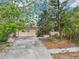 Charming home with a cozy front exterior, complete with a garage and driveway at 9300 Gulf Blvd, St Pete Beach, FL 33706