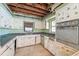 Retro kitchen with vintage oven and countertops at 9300 Gulf Blvd, St Pete Beach, FL 33706
