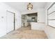 Open layout with attached kitchen and retro lighting at 9300 Gulf Blvd, St Pete Beach, FL 33706