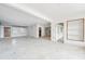 Spacious living area with an open layout, exposed brick accents, and natural light at 9300 Gulf Blvd, St Pete Beach, FL 33706