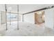 Bright living room featuring a beam and offering flexible design possibilities at 9300 Gulf Blvd, St Pete Beach, FL 33706