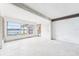 Bright and airy living room, offering a view of the water at 9300 Gulf Blvd, St Pete Beach, FL 33706