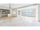 Open-concept living space featuring waterfront views and flexible living areas at 9300 Gulf Blvd, St Pete Beach, FL 33706