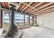 Sun room featuring wood ceilings, many windows for water views, and a unique fireplace feature at 9300 Gulf Blvd, St Pete Beach, FL 33706