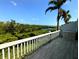 Relaxing deck with a scenic view of lush greenery and serene waterways at 967 Waterside Ln # 1, Bradenton, FL 34209