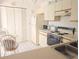 Efficient kitchen with appliances and ample storage, perfect for preparing delicious meals at 967 Waterside Ln # 1, Bradenton, FL 34209