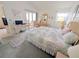 Serene main bedroom featuring a spacious layout, slider access to the deck, and a calming atmosphere at 967 Waterside Ln # 1, Bradenton, FL 34209