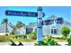 Perico Bay Blvd and Waterside Lane street sign with landscaping at 967 Waterside Ln # 1, Bradenton, FL 34209